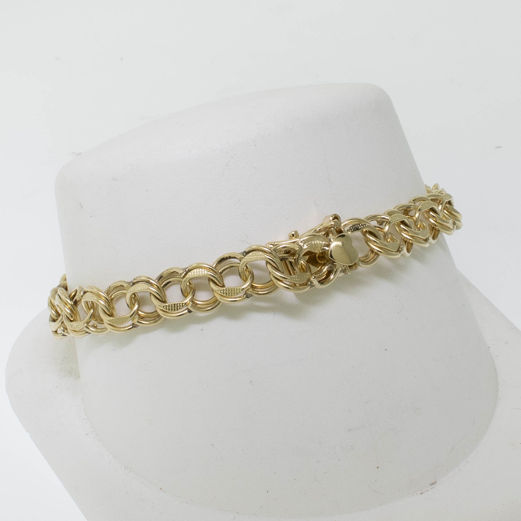 Second hand gold charm bracelet discount