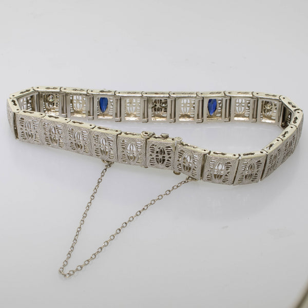 Pre-Owned 14KW Filigree Bracelet 7" 4 Round Diamonds .14CTTW Synthetic Sapphire