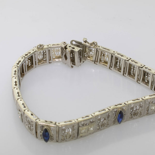 Pre-Owned 14KW Filigree Bracelet 7" 4 Round Diamonds .14CTTW Synthetic Sapphire