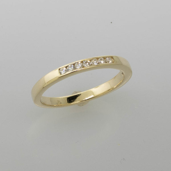 Pre-Owned 14K Yellow Gold Channel Diamond Band Ring Size 9.5